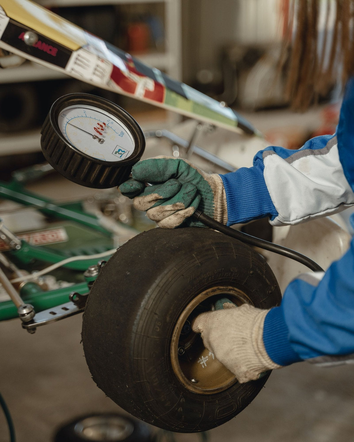 Checking tire pressure with a gauge